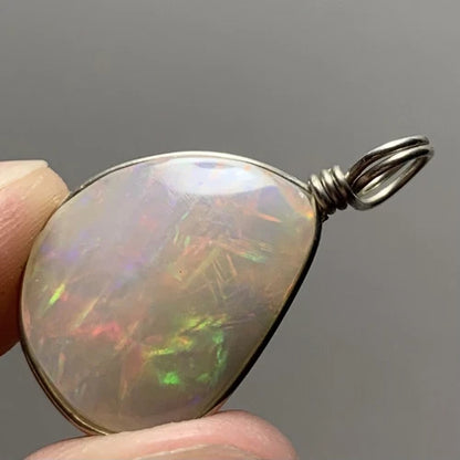 Natural Ethiopian Opal in Silver Wire Pendant Untreated
